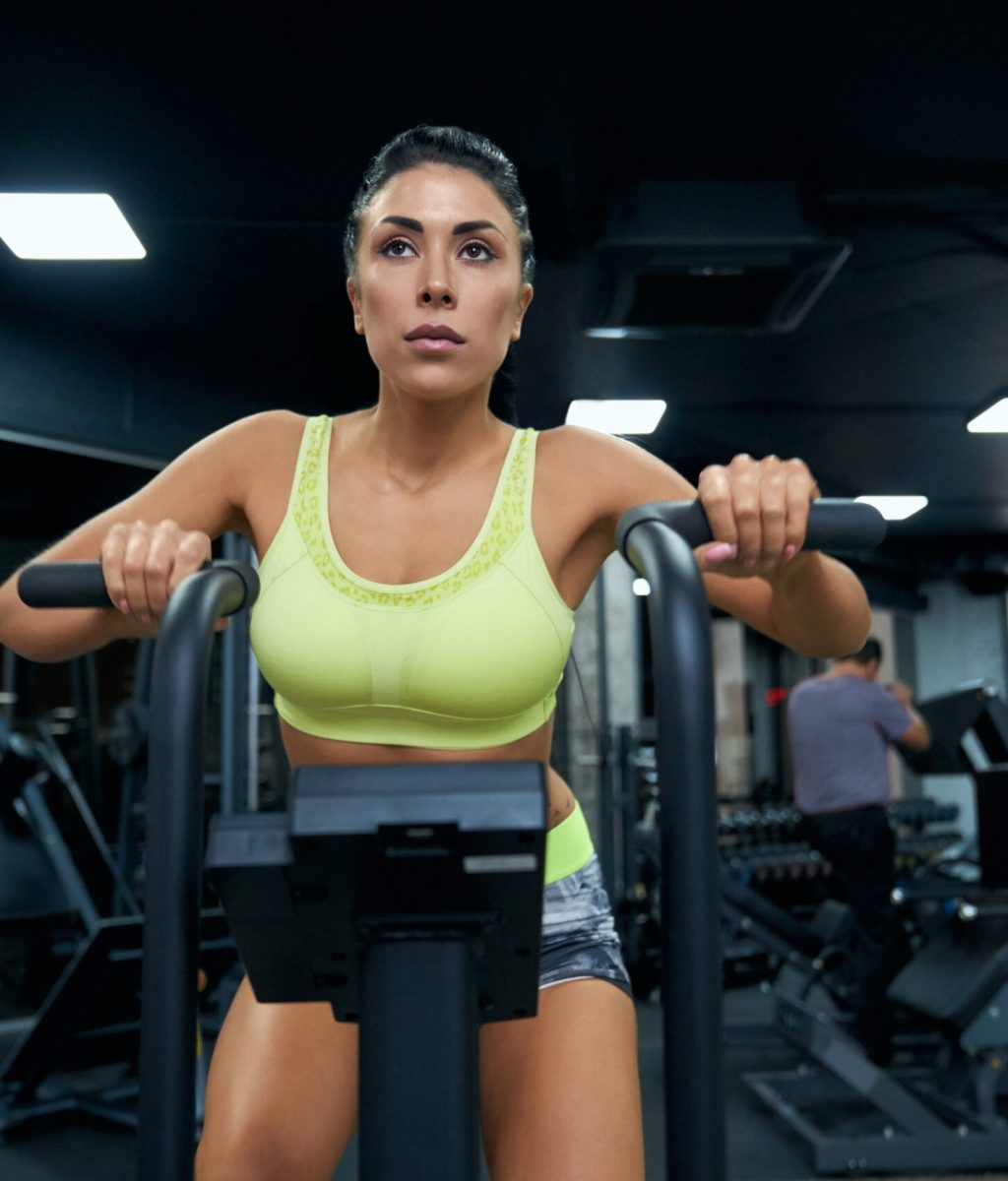 Fit woman doing cardio in himachal pradesh gym